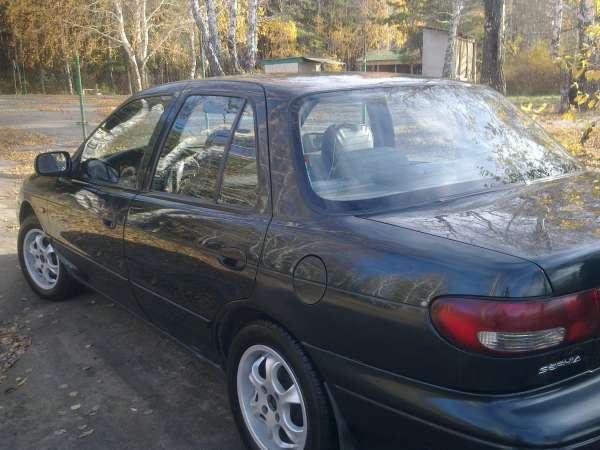 kia sephia 1997 фото салона
